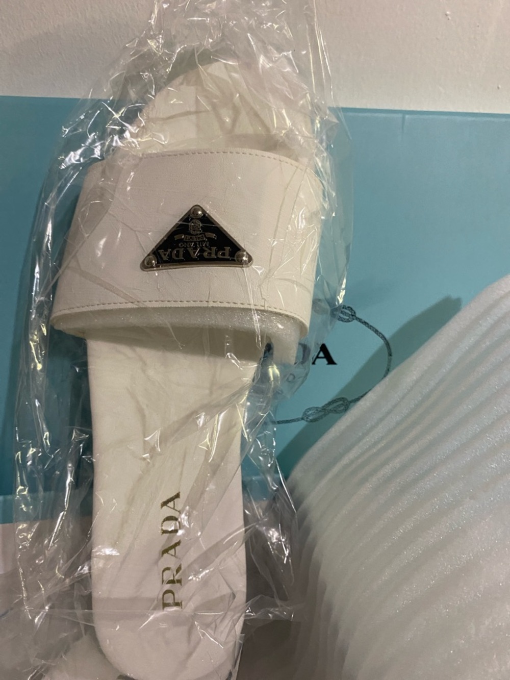 Prada White Leather Slide with Gold-Tone Triangle Logo